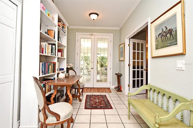 interior space with crown molding, french doors, and light tile patterned flooring