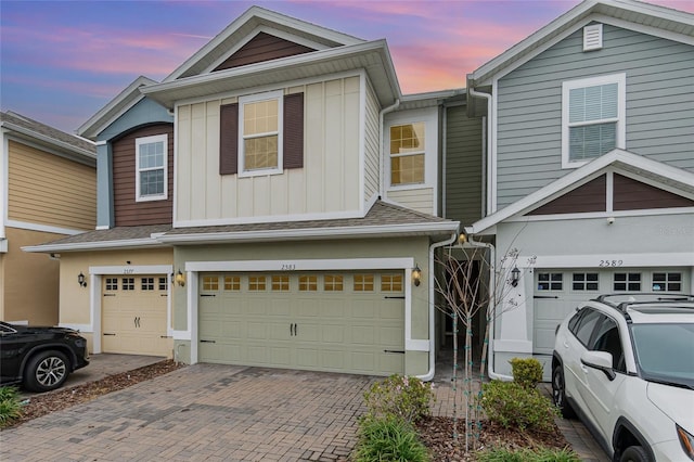 view of front of property with a garage