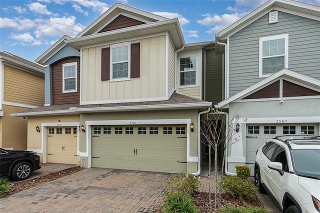 view of front of property with a garage