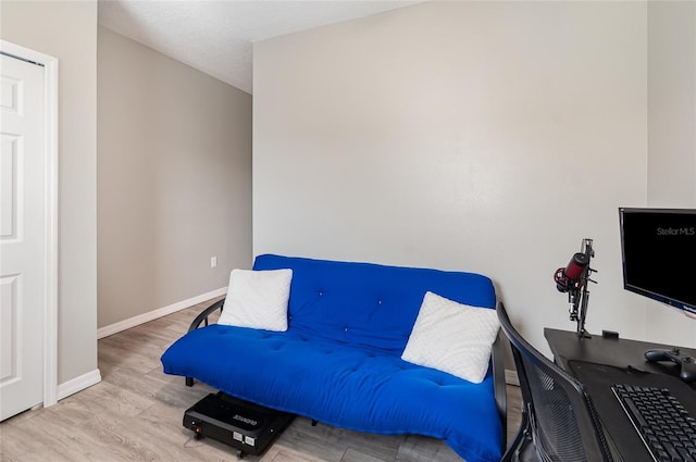 sitting room with light hardwood / wood-style flooring