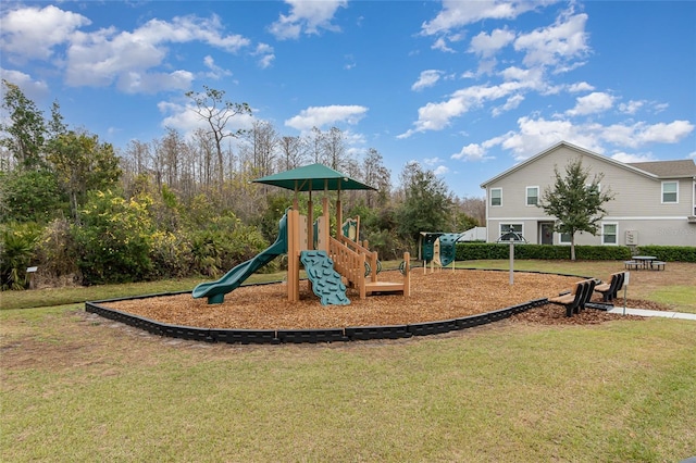 view of play area featuring a lawn