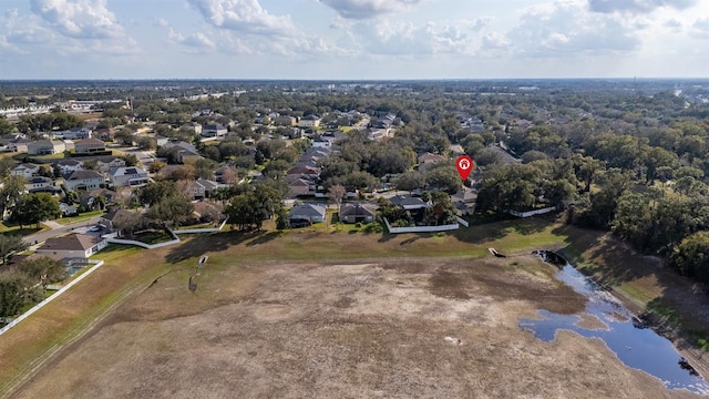 aerial view with a water view and a residential view