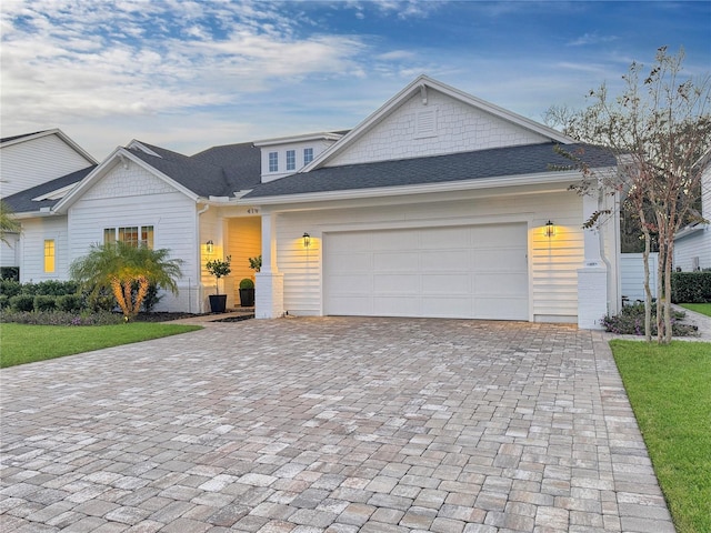 view of front of property featuring a garage