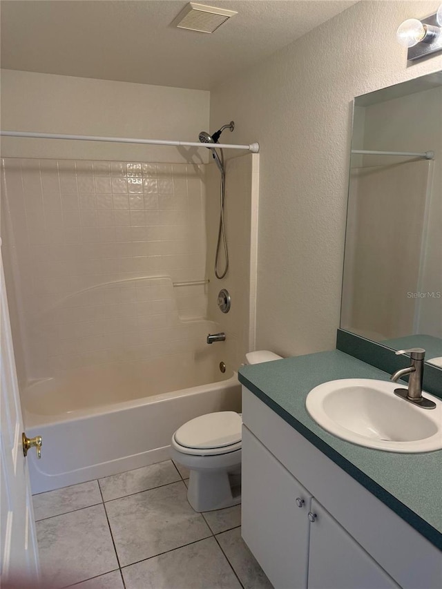 full bathroom featuring vanity, toilet, tile patterned flooring, and shower / bathing tub combination