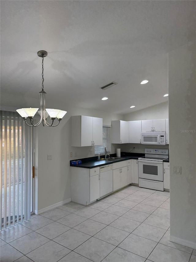 kitchen with white cabinetry, sink, white appliances, and decorative light fixtures