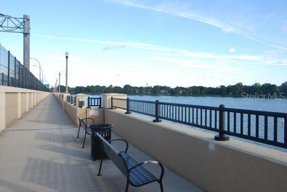 view of patio with a water view