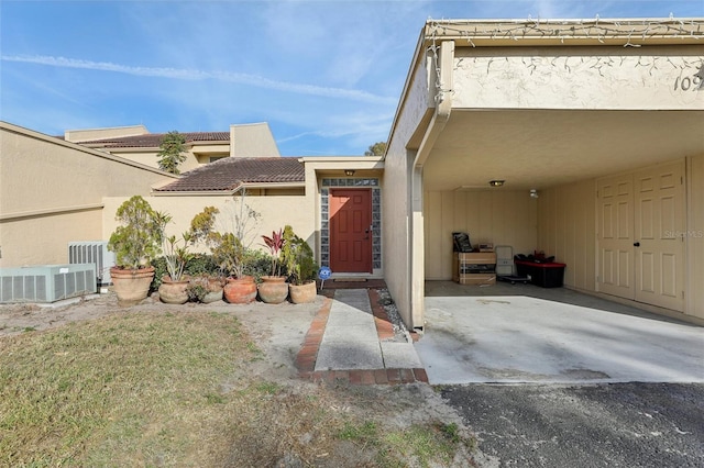 property entrance featuring cooling unit