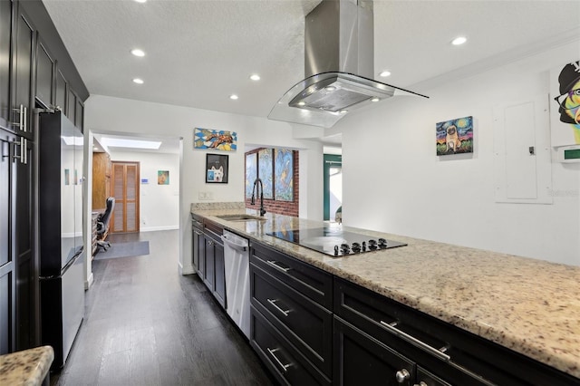 kitchen with sink, stainless steel appliances, dark hardwood / wood-style floors, light stone counters, and island range hood