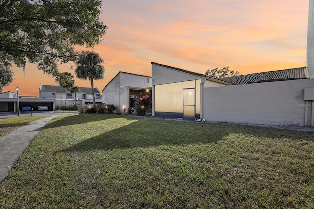 exterior space featuring a lawn