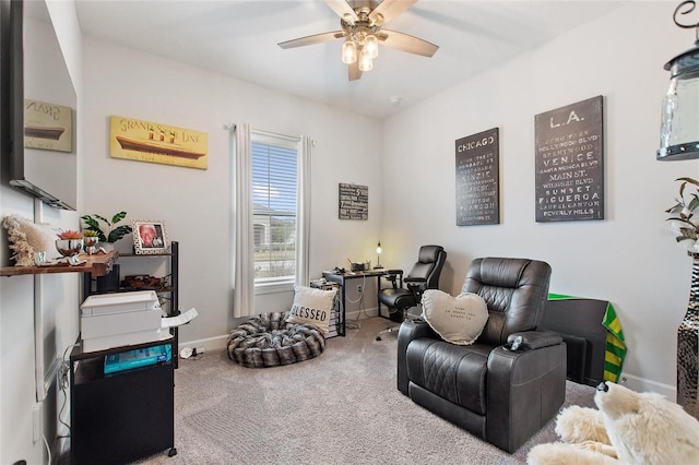 sitting room featuring carpet floors and ceiling fan