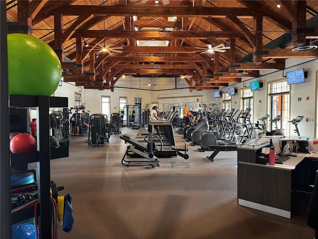 gym with wood ceiling and high vaulted ceiling