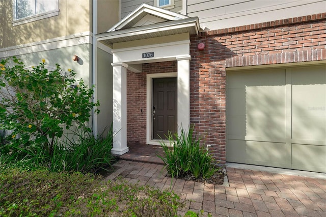 property entrance featuring a garage