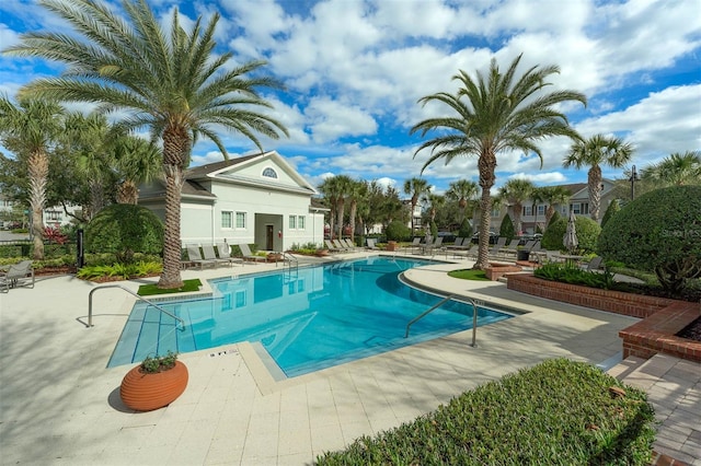 view of pool featuring a patio