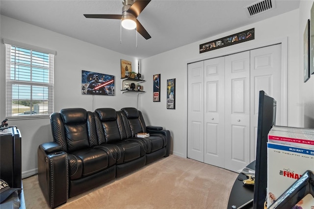 interior space featuring ceiling fan