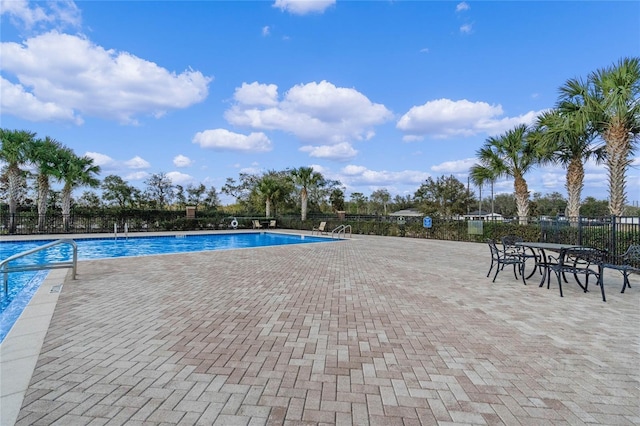 view of pool featuring a patio area