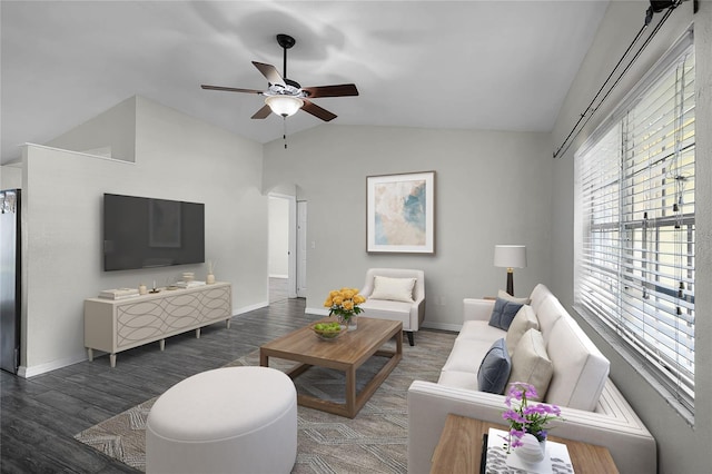 living room featuring ceiling fan, lofted ceiling, and dark hardwood / wood-style flooring