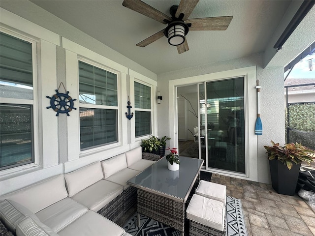 view of patio with an outdoor hangout area and ceiling fan