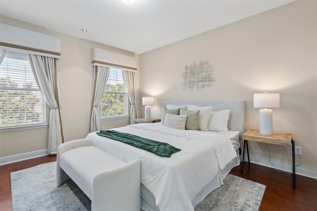 bedroom featuring dark wood-type flooring