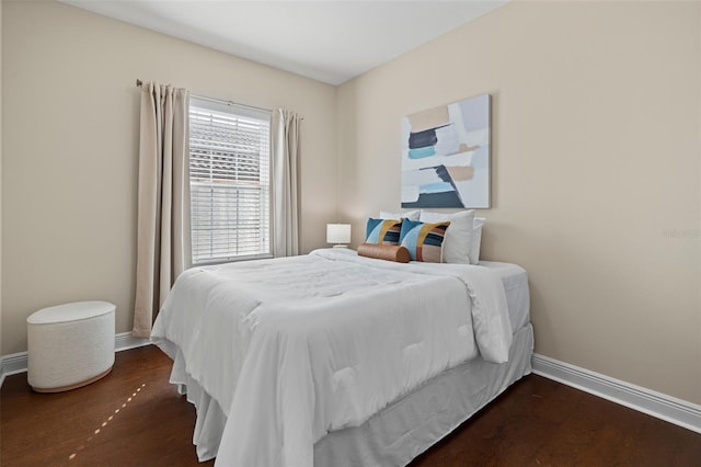 bedroom featuring dark wood-type flooring