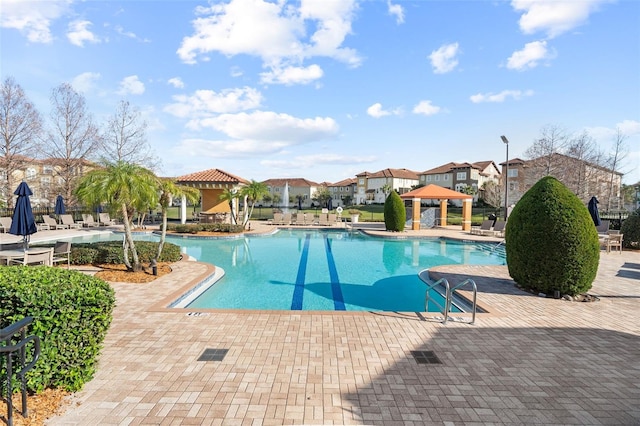 view of pool with a gazebo and a patio