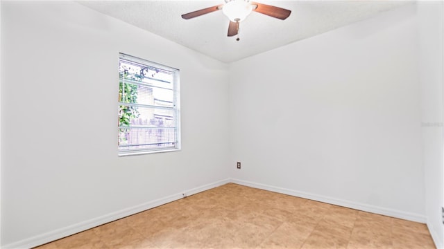 unfurnished room featuring ceiling fan