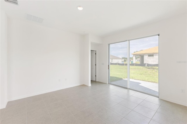 view of tiled spare room