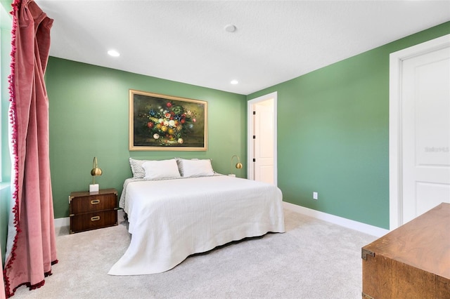 bedroom featuring recessed lighting, baseboards, and carpet