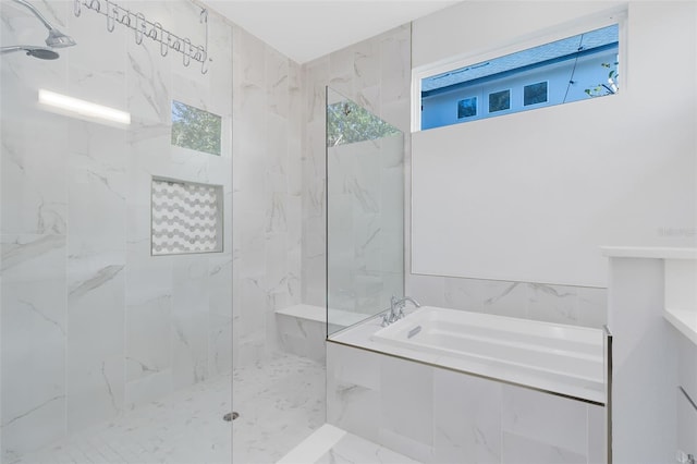 full bathroom with marble finish floor, a garden tub, and a marble finish shower