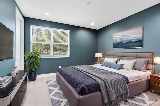 bedroom with baseboards and recessed lighting