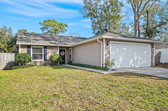 single story home featuring a garage and a front yard