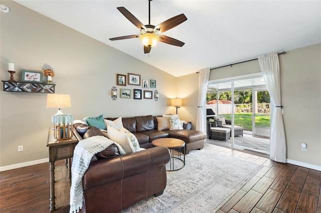 living room featuring lofted ceiling and ceiling fan