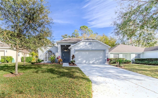 view of front facade featuring a garage and a front lawn