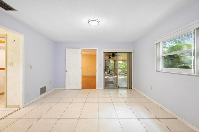 view of tiled empty room