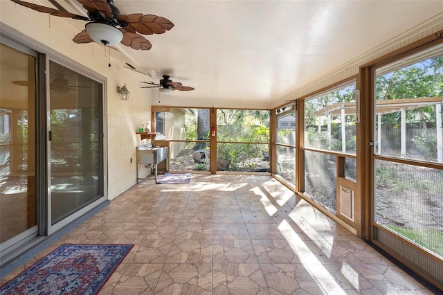 unfurnished sunroom with plenty of natural light