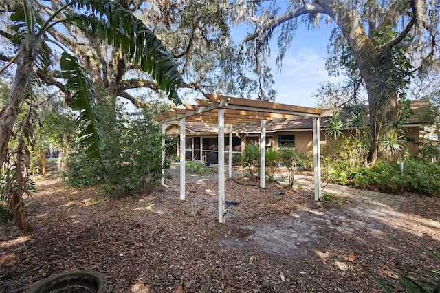 view of yard with a pergola