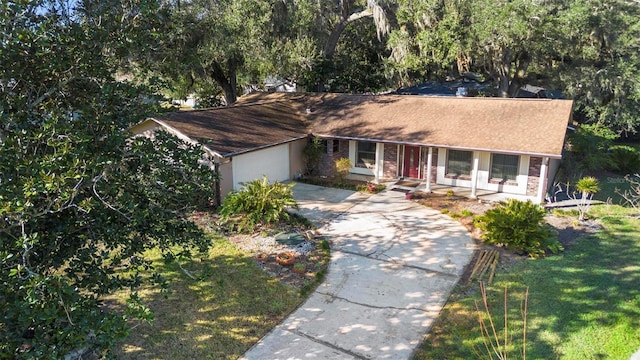ranch-style house with a front lawn