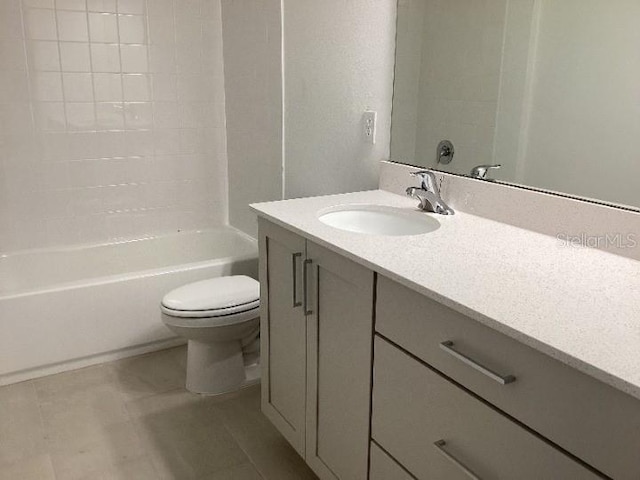 full bathroom featuring vanity, tile patterned floors, toilet, and shower / bath combination