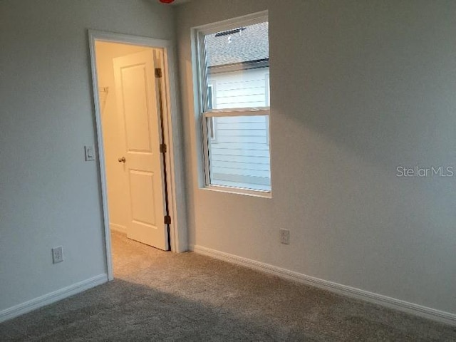 view of carpeted spare room