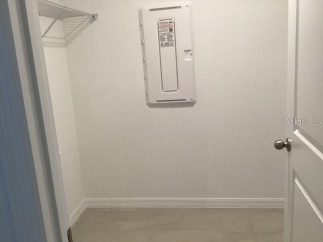 spacious closet featuring electric panel