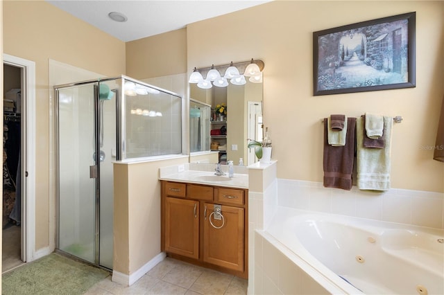 bathroom featuring plus walk in shower, tile patterned floors, and vanity