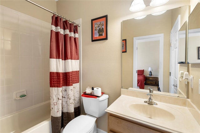 full bathroom featuring shower / bath combination with curtain, vanity, and toilet