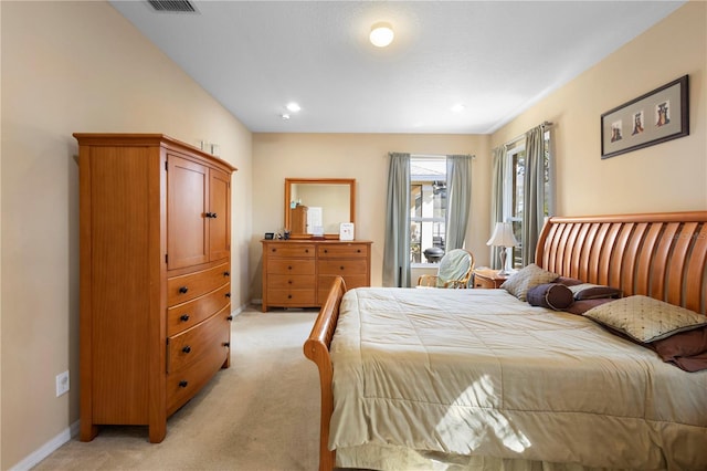 bedroom with light carpet