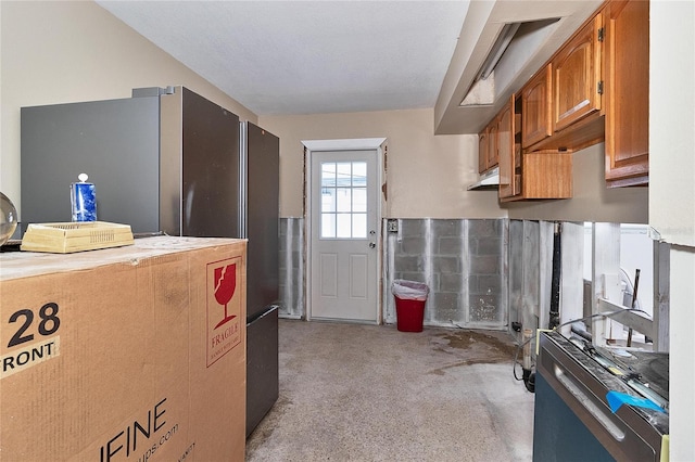 kitchen featuring stainless steel fridge