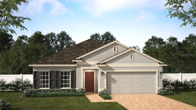 view of front of property featuring a garage and a front yard