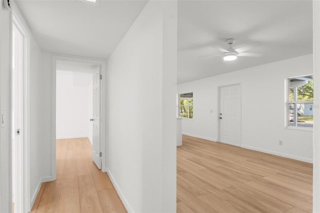 hallway featuring light wood-type flooring