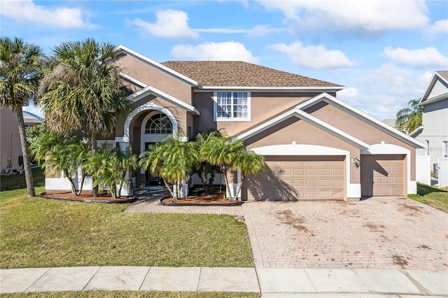 front facade featuring a front yard