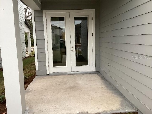 doorway to property featuring french doors