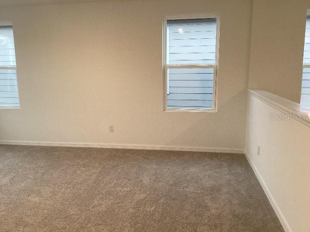 view of carpeted spare room