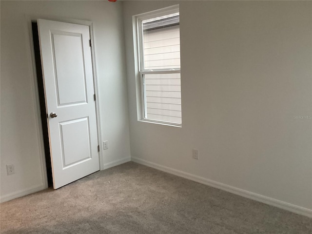 view of carpeted spare room