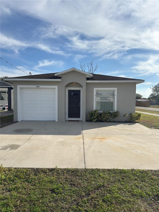 single story home with a garage